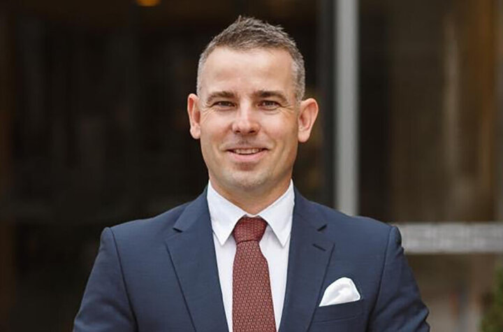 Businessman in formal attire outdoors