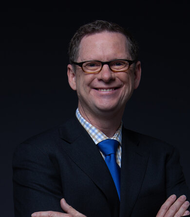 Portrait of a smiling man in a suit